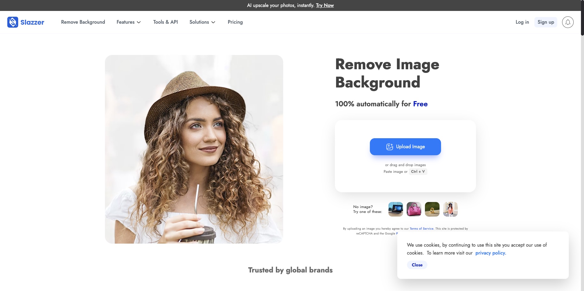 Slazzer e-commerce background removal interface showing Shopify and WooCommerce integration features with bulk product photo processing